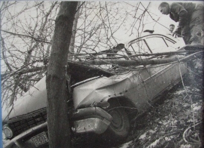 My Uncle Willie pulling a wreck out of Fallingbrook Ravine<br />Picture from mid 1960's