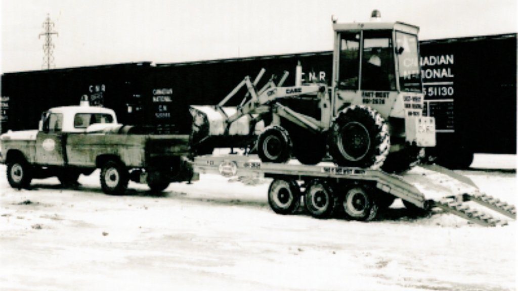 Historic black and white photograph of early East-West snow equipment in Toronto, family owned since 1958