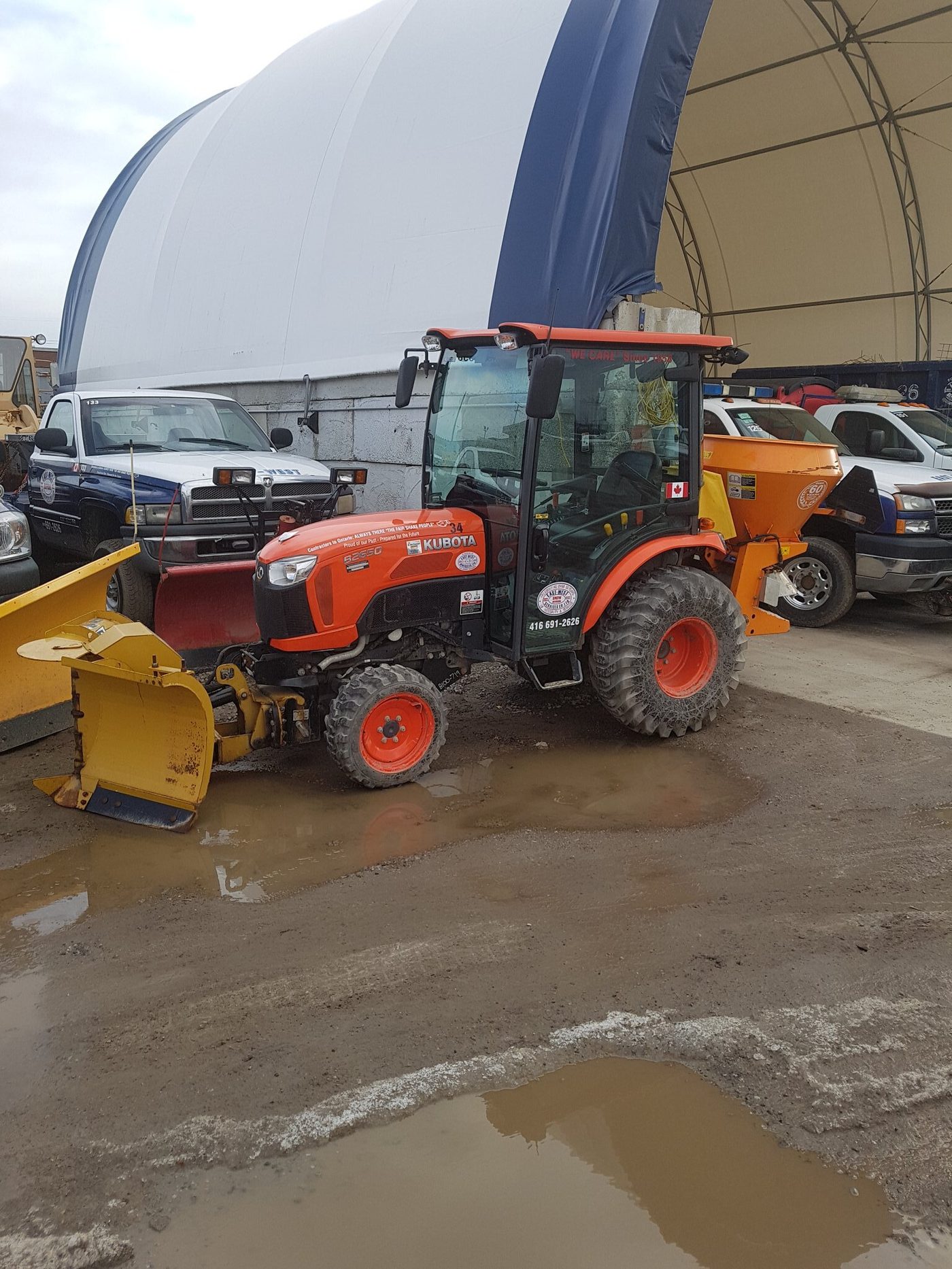 East-West Kubota sidewalk snow clearing machines used on Toronto commercial properties