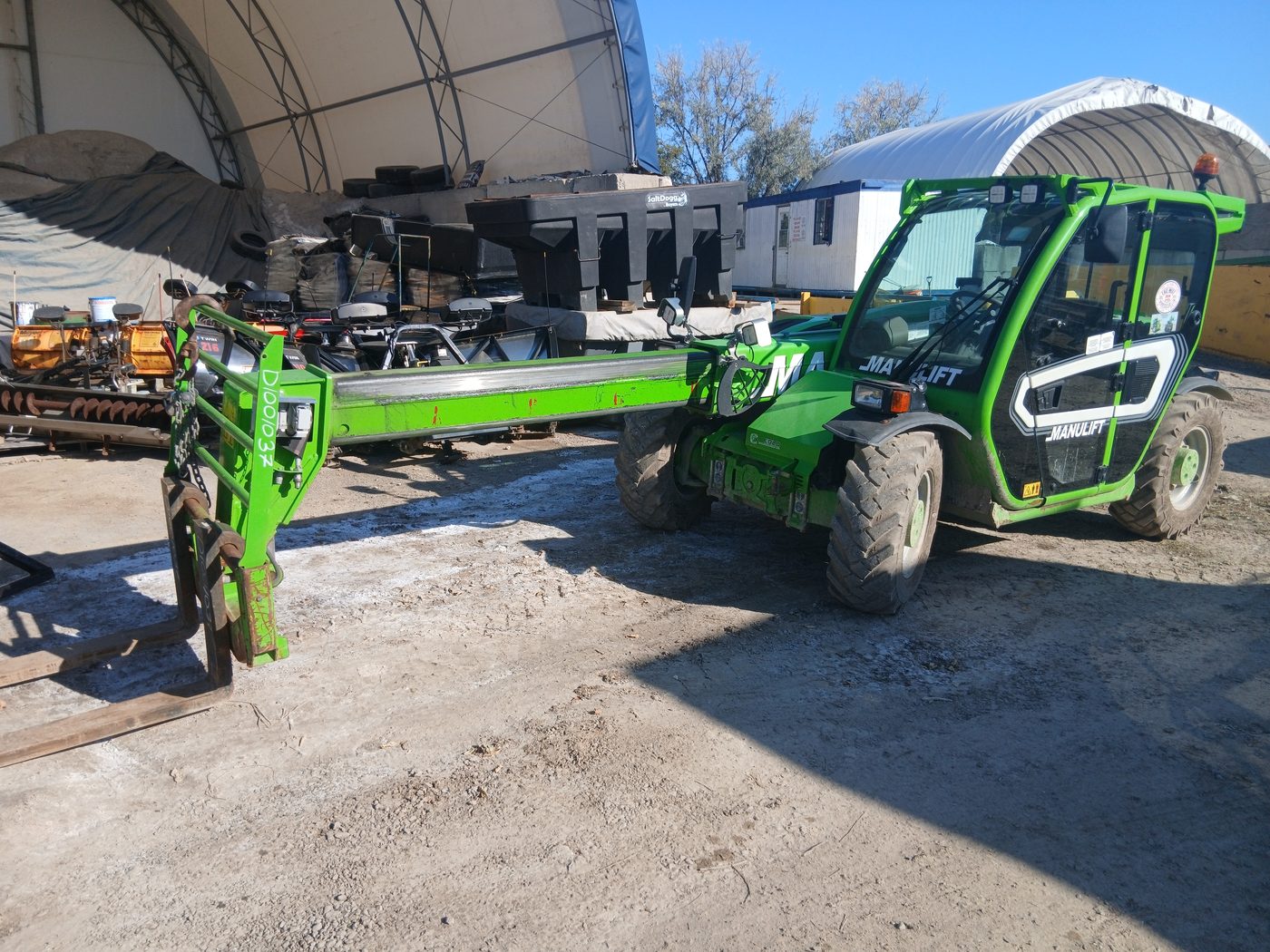 East-West telehandler and heavy equipment maintained in-house for large commercial snow removal sites